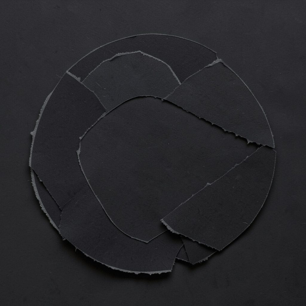 Circular dark logo emblem for 31TEN Lounge with gold detailing on a charcoal background